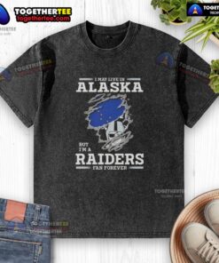 Good I May Live in Alaska But I'm a Raiders Fan Forever washed t-shirt, showcasing team pride in a stylish design.