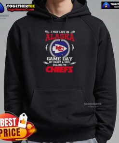Alt Text: Kansas City Chiefs hoodie worn in Alaska, showcasing team spirit on game day with a vibrant design.