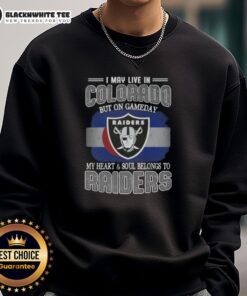 Alt Text: Cozy 'Good I May Live In Colorado But On Gameday My Heart And Soul Belongs To Raiders' sweatshirt on display.
