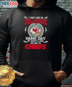 Alt Text: Fan wearing Kansas City Chiefs hoodie, showcasing pride in Delaware on game day with team spirit and enthusiasm.