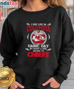 Person wearing a Kansas City Chiefs sweatshirt, showcasing team pride in the District of Columbia on game day.