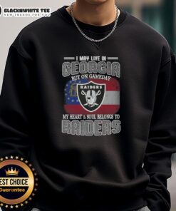 Alt Text: Good I May Live in Georgia But On Gameday My Heart and Soul Belongs to Raiders Sweatshirt, perfect for fans.