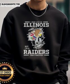 Alt Text: Good I May Live in Illinois But I'm A Raiders Fan Forever Sweatshirt featuring bold team graphics and cozy design.