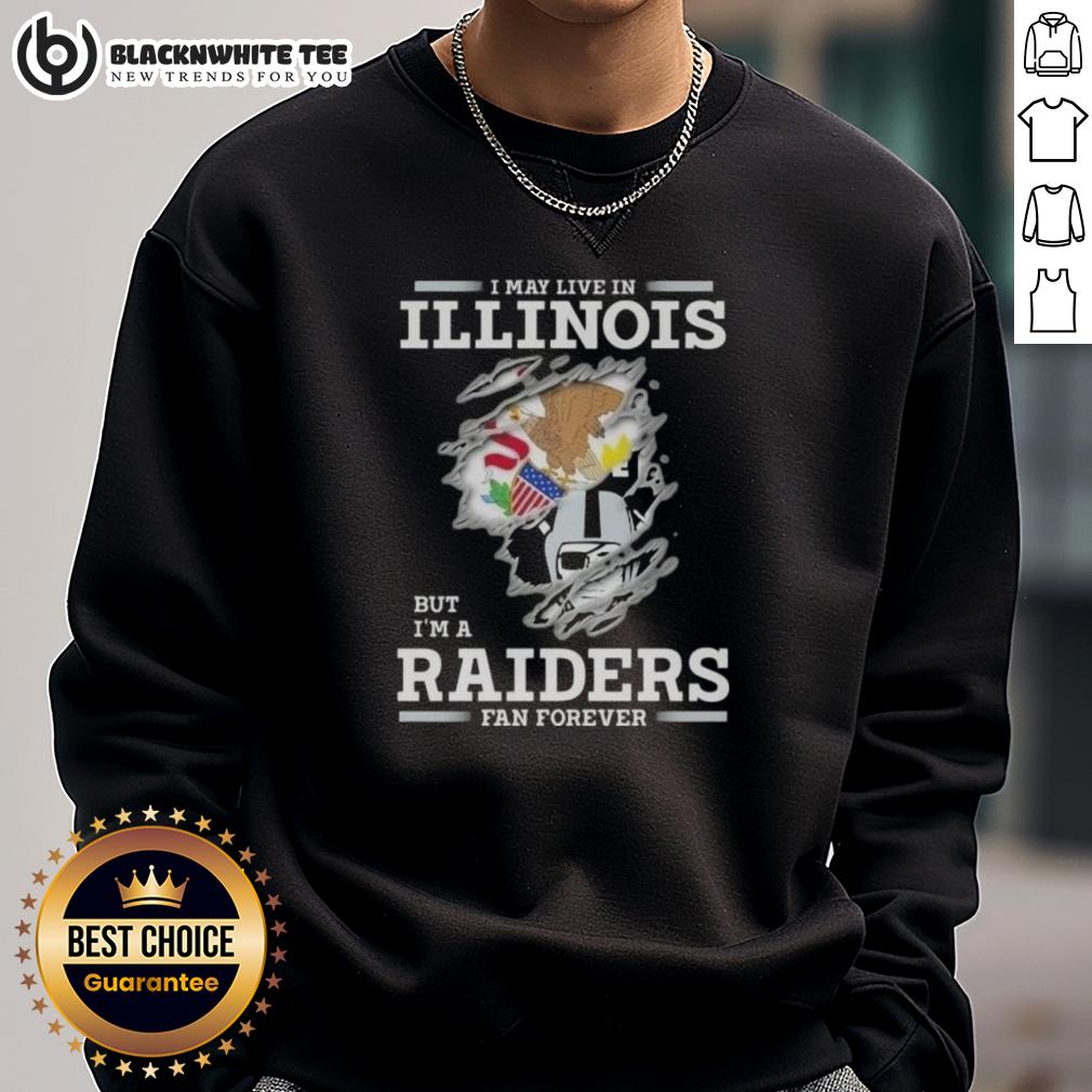 Good I May Live In Illinois But I'M A Raiders Fan Forever Sweatshirt Alt Text: Good I May Live in Illinois But I'm A Raiders Fan Forever Sweatshirt featuring bold team graphics and cozy design.