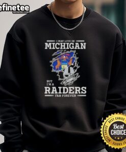 Cozy sweatshirt featuring 'Good I May Live In Michigan But I'm A Raiders Fan Forever' design, perfect for loyal Raiders fans.