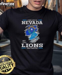 Good I May Live In Nevada But I'M A Lions Fan Forever T-Shirt design showcasing team pride for Detroit Lions fans.
