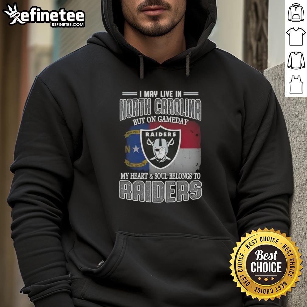 good-i-may-live-in-north-carolina-but-on-gameday-my-heart-and-soul-belongs-to-raiders-hoodie Person wearing a Raiders hoodie, showcasing team spirit in North Carolina on game day, heart and soul with Raiders.