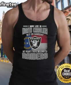 North Carolina fan wearing a Raiders tank top, showcasing team spirit on game day with pride and style.
