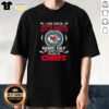 Fan wearing 'Good I May Live In South Dakota But On Game Day My Heart And Soul Belongs To Kansas City Chiefs' T-shirt.