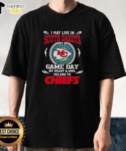Fan wearing 'Good I May Live In South Dakota But On Game Day My Heart And Soul Belongs To Kansas City Chiefs' T-shirt.