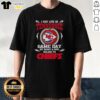 Alt Text: Tennessee fan wearing Kansas City Chiefs T-shirt on game day, showcasing team spirit and loyalty.