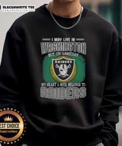 Fan wearing a Raiders sweatshirt, showcasing team spirit in Washington on game day. Heart and soul belongs to Raiders.