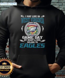 Person wearing a Philadelphia Eagles hoodie in West Virginia, showcasing team spirit on game day.