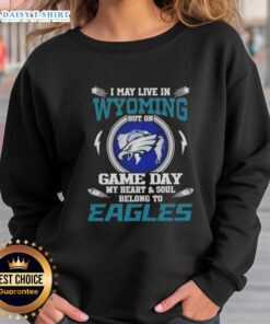 Alt Text: Philadelphia Eagles sweatshirt showing pride for the team, perfect for game day in Wyoming.