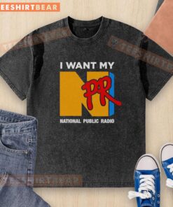 Alt Text: Good I Want My NPR National Public Radio washed t-shirt displayed on a wooden background, showcasing its vintage style.