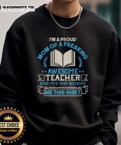 Proud mom wearing a sweatshirt that says I'm a Proud Mom of a Freaking Awesome Teacher in vibrant colors.