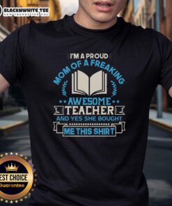 Proud mom wearing a t-shirt that says 'I'm a Proud Mom of a Freaking Awesome Teacher' celebrating her child.