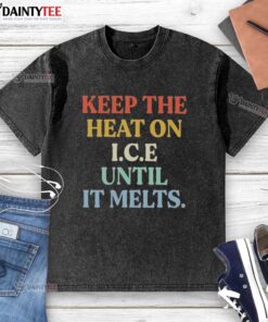 Good Keep The Heat On I.C.E. Until It Melts washed t-shirt showcasing a trendy design for casual wear.