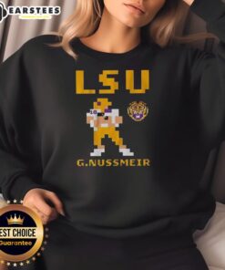 Garrett Nussmeier wearing a retro LSU Tigers football sweatshirt, showcasing team spirit and vintage style.
