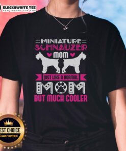 Cool Miniature Schnauzer mom wearing a stylish tee, showcasing love for her pet in a fun and trendy way.