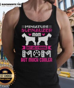Cool Miniature Schnauzer mom wearing a stylish tank top, showcasing her love for dogs with a fun and trendy vibe.