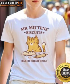 Good Mr. Mittens Biscuits Baked Fresh Daily T-Shirt featuring a cute cat graphic and playful typography.
