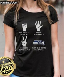 Ladies tee featuring the Seattle Seahawks football logo, perfect for fans and casual wear.