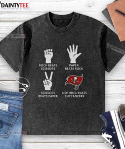 Alt Text: Good Nothing Beats Tampa Bay Buccaneers Football Logo on a washed t-shirt, perfect for fans and casual wear.