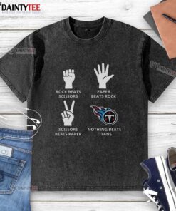 Alt Text: Tennessee Titans football logo on a washed t-shirt, showcasing team spirit and style for fans.