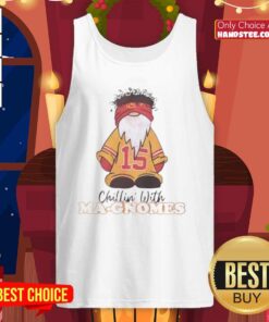 Patrick Mahomes in a Kansas City Chiefs tank top, relaxing with garden gnomes, showcasing team spirit and fun vibes.