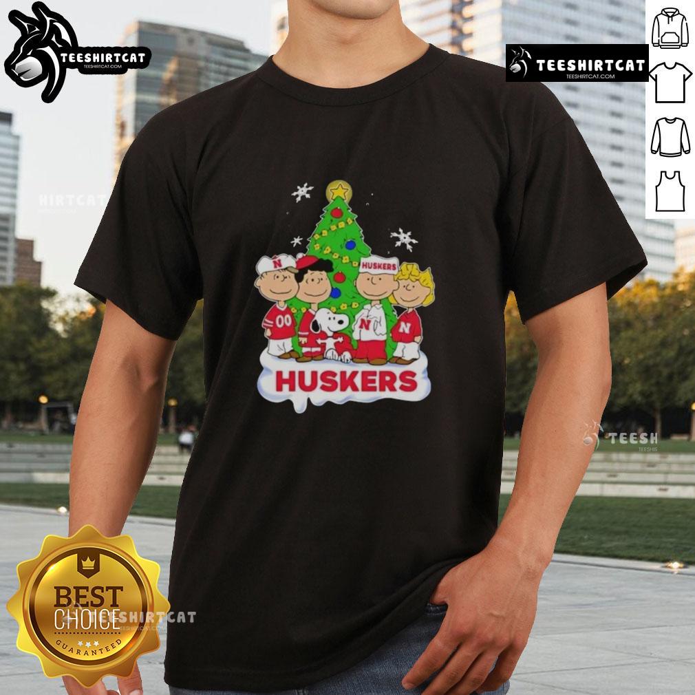 Good Peanuts Characters X Nebraska Cornhuskers Chrismas T Shirt Good Peanuts Characters Christmas T-Shirt featuring Nebraska Cornhuskers logo, perfect for holiday sports fans.