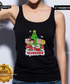 Good Peanuts characters wearing Nebraska Cornhuskers Christmas tank top, festive design perfect for holiday fans.