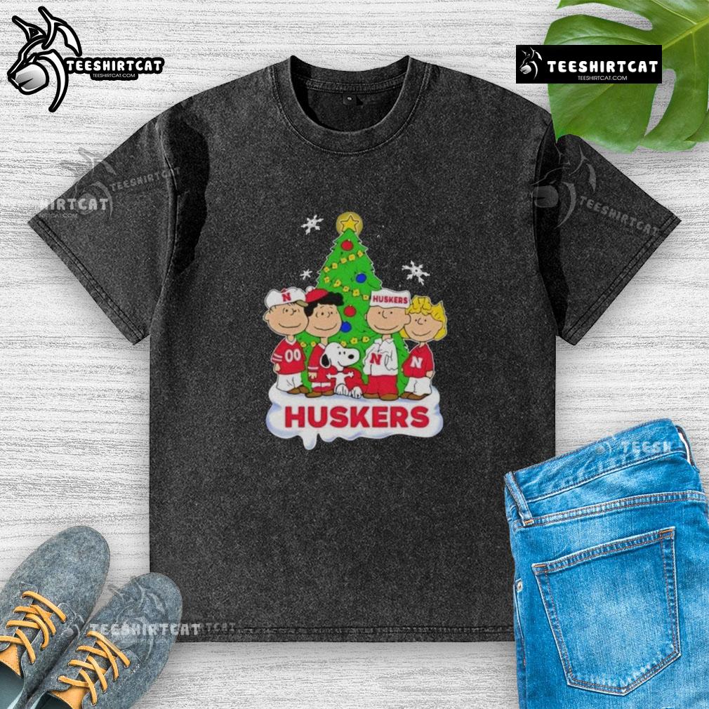Good Peanuts Characters X Nebraska Cornhuskers Chrismas Washed T Shirt Good Peanuts characters on Nebraska Cornhuskers Christmas washed t-shirt, perfect for holiday fans and sports enthusiasts.