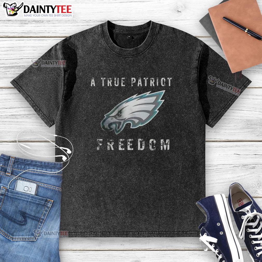 good-philadelphia-eagles-football-a-true-patriot-freedom-washed-t-shirt Alt Text: Good Philadelphia Eagles Football A True Patriot Freedom Washed T-Shirt displayed on a wooden background.