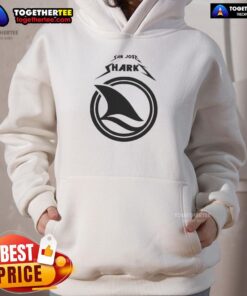 Fan wearing a cozy hoodie at a San Jose Sharks game day, showcasing team spirit and excitement for the match.