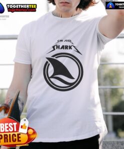 Enthusiastic fan wearing a favorite t-shirt at a San Jose Sharks game day, showcasing team spirit and excitement.