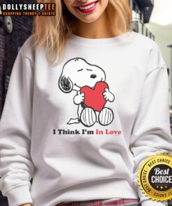 Good Snoopy I Think I'm In Love sweatshirt featuring a cute Snoopy graphic, perfect for cozy casual wear.