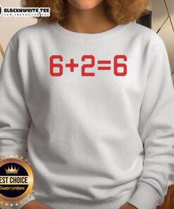 Alt Text: Baker Mayfield and Emeka Egbuka wearing Good Tampa Bay Buccaneers 6-2-6 sweatshirt, showcasing team spirit.