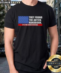 Good They Found The Handbook T-Shirt featuring the US Constitution and American flag design, perfect for patriots.