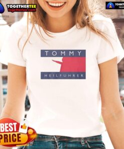 Good Tommy Heilfuhrer logo parody on a ladies tee, featuring bold graphics and a humorous twist on classic designs.