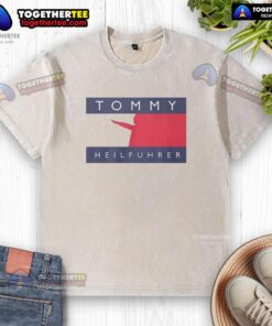 Good Tommy Heilfuhrer logo parody on a washed t-shirt, featuring a unique and humorous design for casual wear.