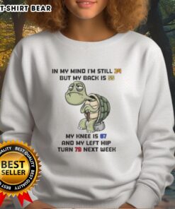Cozy sweatshirt design featuring 'Good Turtle' graphic and humorous text about aging, perfect for casual wear.