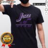 Vintage Utah Jazz Fly By T-Shirt featuring retro design and vibrant colors, perfect for basketball fans and collectors.