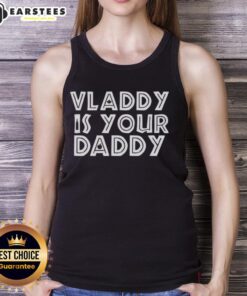Vladimir Guerrero Jr. in a stylish Toronto Blue Jays tank top with 'Vladdy Is Your Daddy' slogan, showcasing baseball pride.