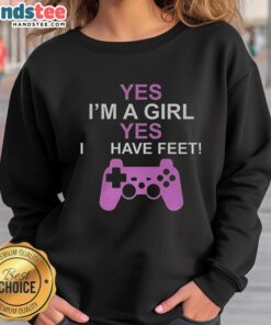 Girl wearing 'Good Yes I'm A Girl Yes I Have Feet' sweatshirt, showcasing casual style and playful attitude.