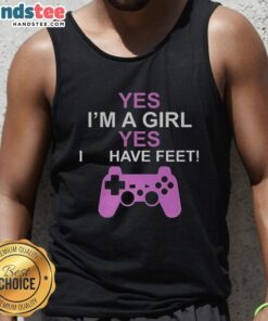 Woman wearing a 'Good Yes I'm a Girl Yes I Have Feet' tank top, showcasing casual summer fashion and confidence.