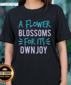 Happy flower blossoms for its own joy on a ladies tee, showcasing vibrant colors and a cheerful design.