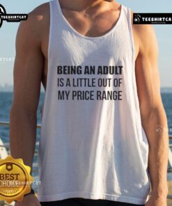 Alt Text: Woman wearing a 'Happy Being an Adult Is a Little Out of My Price Range' tank top, smiling in a sunny outdoor setting.