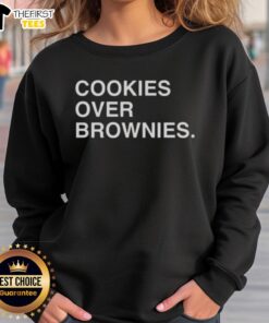 Happy Cookies Over Brownies sweatshirt featuring playful text design, perfect for cookie lovers and cozy fashion.