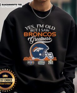 Alt Text: Vintage Denver Broncos sweatshirt featuring 'Yes, I'm old but I saw greatness' slogan with a football helmet design.